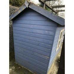 Houten speelhuisje