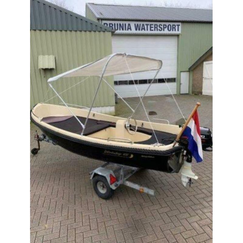 Prima onderhouden Wiedesloep met 6 pk Suzuki four stroke.