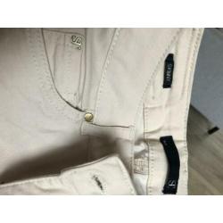 Lichtroze supertrash jeans maat 24