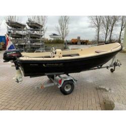 Prima onderhouden Wiedesloep met 6 pk Suzuki four stroke.