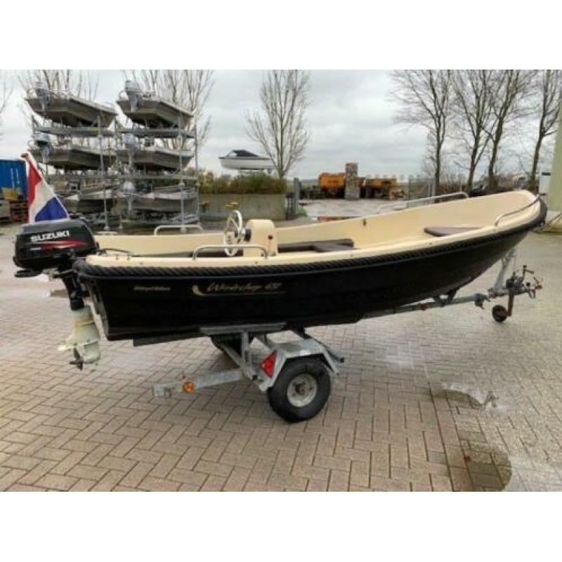 Prima onderhouden Wiedesloep met 6 pk Suzuki four stroke.
