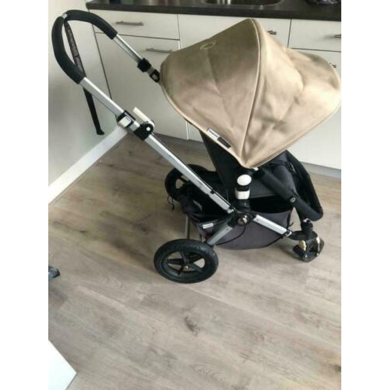 Bugaboo cameleon kinderwagen en reiswieg.