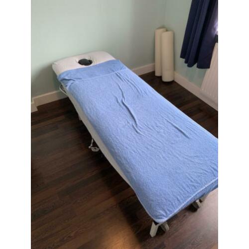 Mechanische massagetafel.
