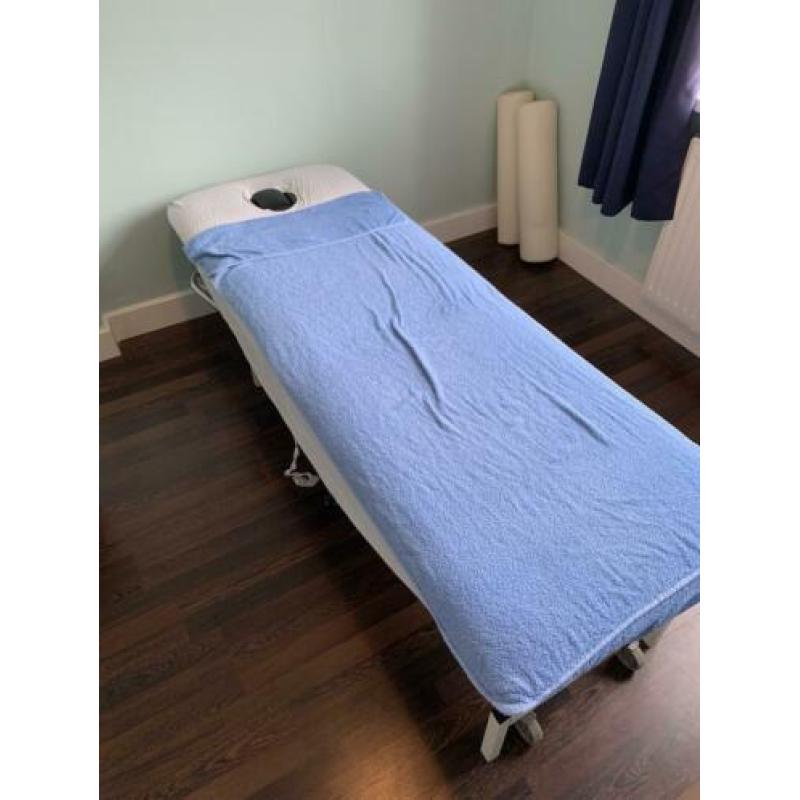 Mechanische massagetafel.