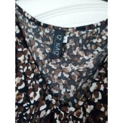 Soepel vallende top maat 46
