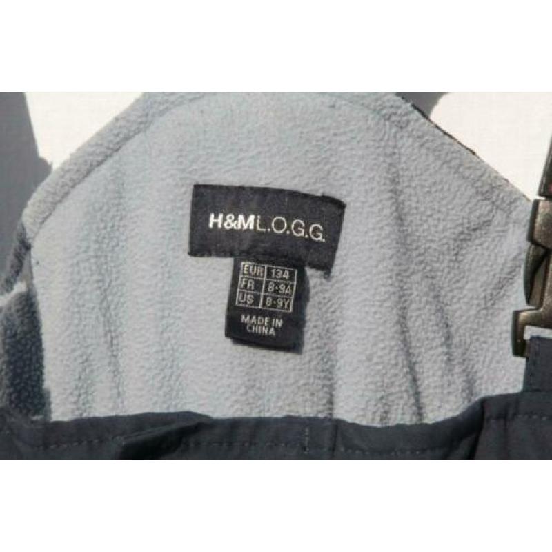 Blauwe skibroek met bretels.Mt 134.Merk H&M