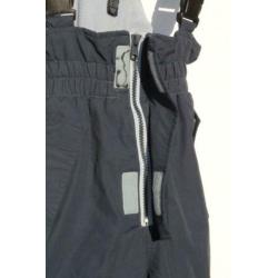 Blauwe skibroek met bretels.Mt 134.Merk H&M