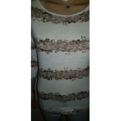 Begin vest maat 36 z.g.a.n (top is ook te koop)