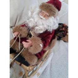Kerstman in arreslee met muziek en bewegend 10 euro