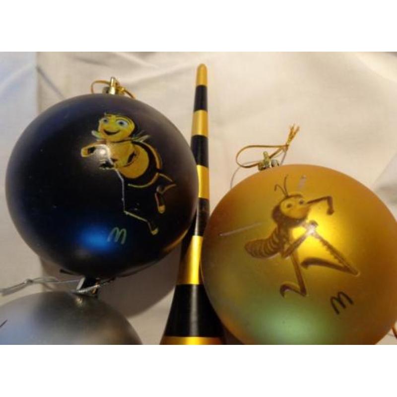 Vier plastic kerstballen piek van Bee Movie en McDonalds