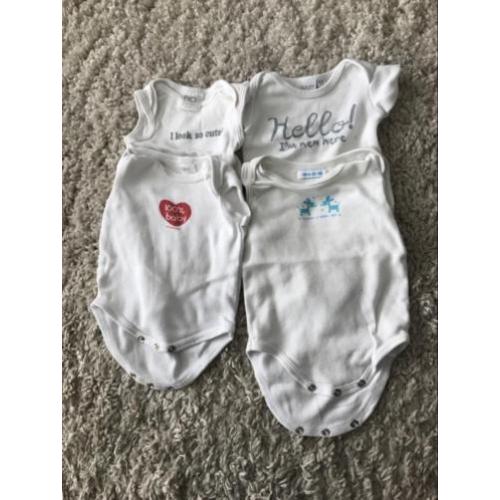 Vier witte rompers