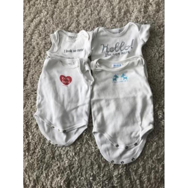 Vier witte rompers