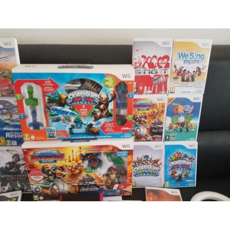 21 wii spellen krasvrij /uitgebreide wii set controllers enz